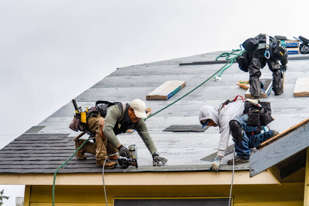 Professional Roofing technician working in Bloomingdale, NY